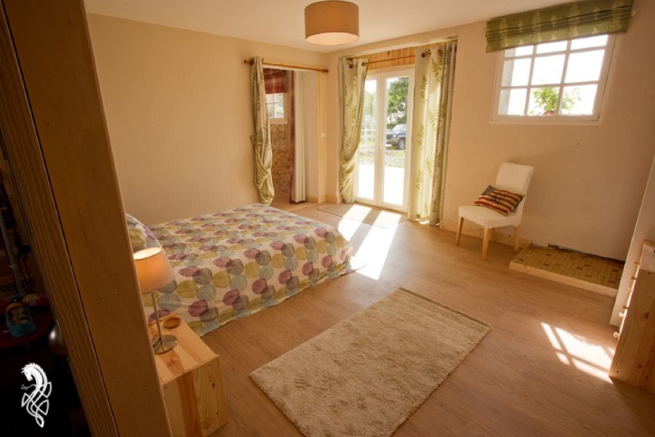 Main Bedroom facing west with large windows