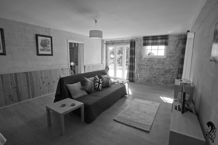 Livingroom facing West, large entrance windows