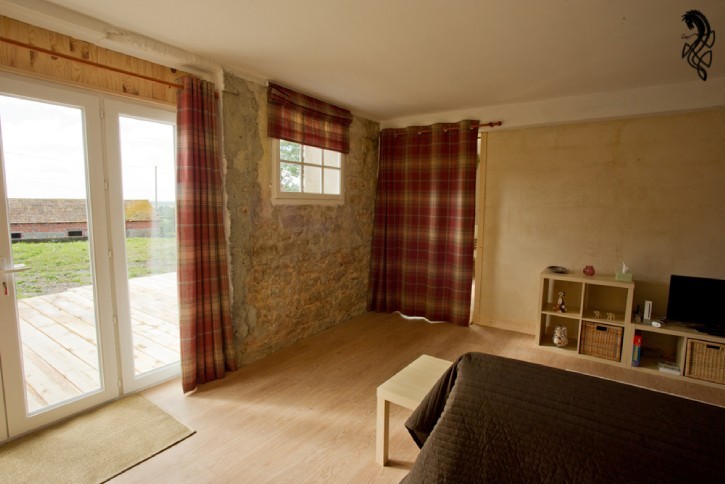 Livingroom view, curtains to main Bedroom